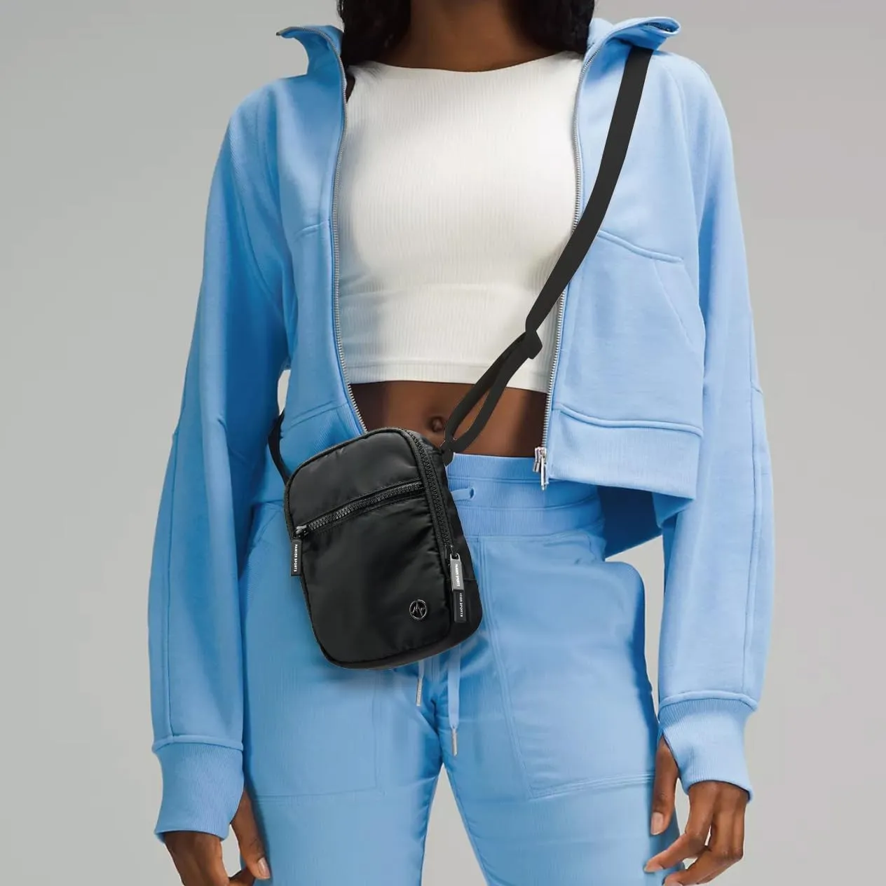 Pander Water-Repellent Crossbody Bag with Adjustable Strap - Perfect for Travel and Everyday Use.