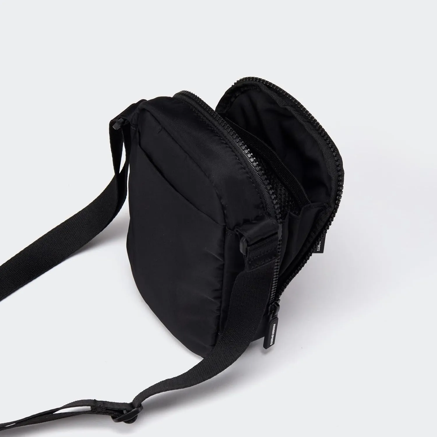 Pander Water-Repellent Crossbody Bag with Adjustable Strap - Perfect for Travel and Everyday Use.